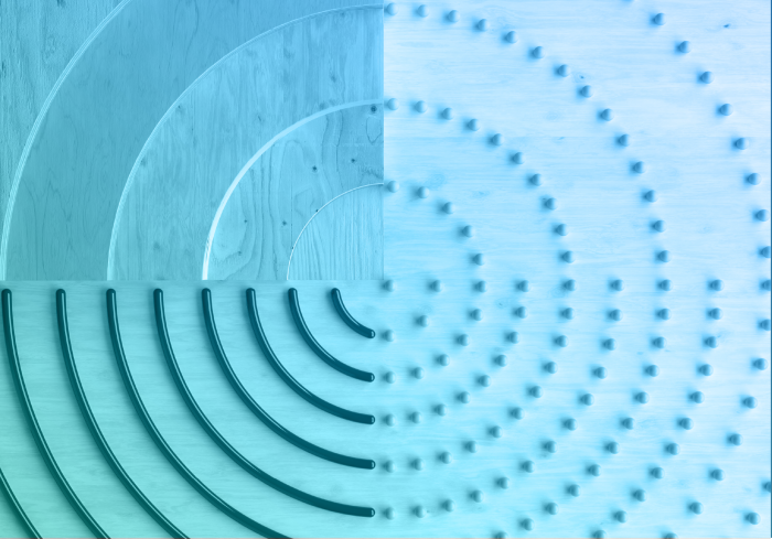 An abstract, light-blue-toned graphic image featuring concentric circular patterns divided into four distinct quadrants on a wooden-textured background.