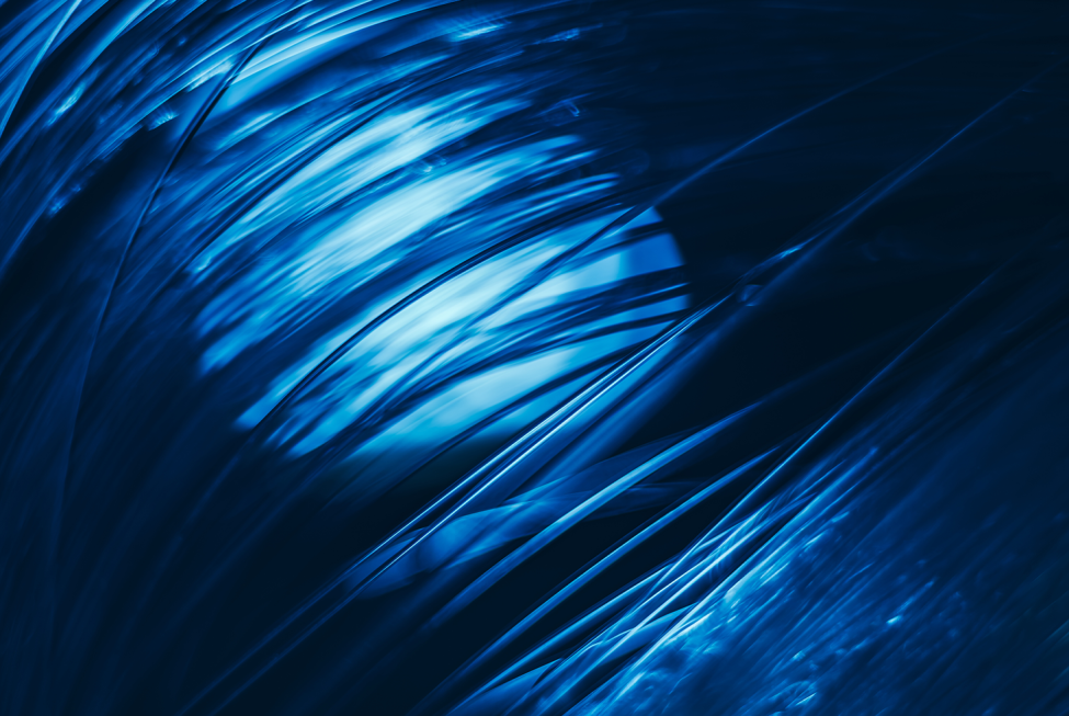 This image shows blue optical fiber against a dark background.