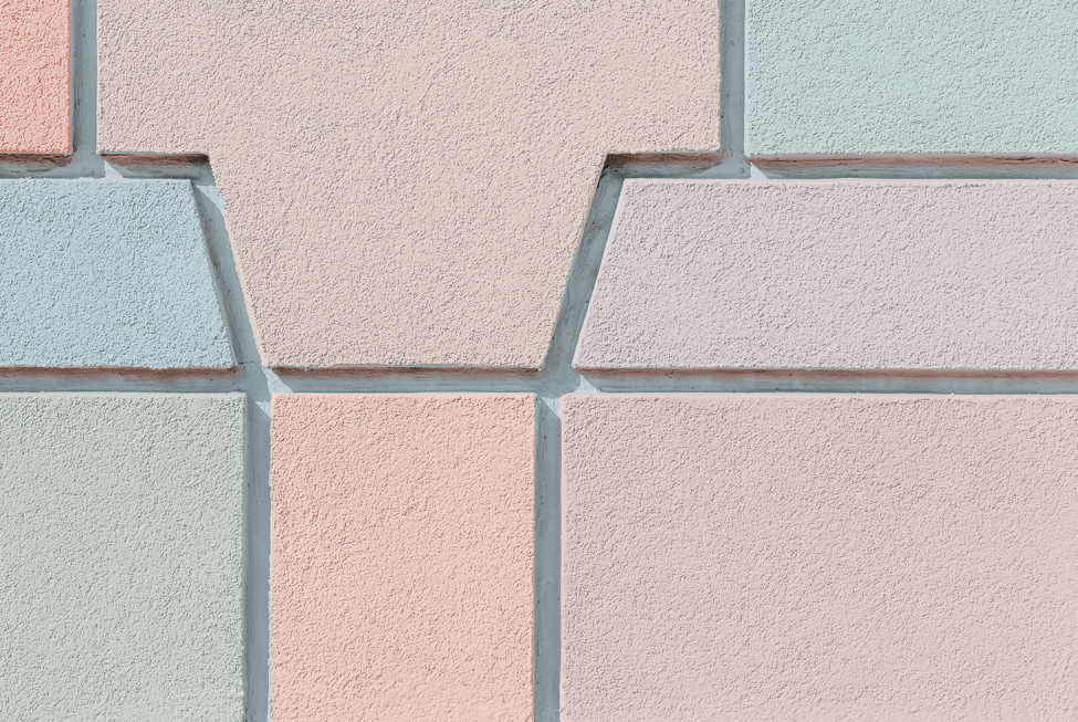 This image shows the colorful decorative moulding on a building exterior.